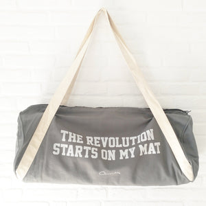 Bolsa de transporte "The revolution starts on my mat".